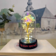 Роза с послание Честит Празник в стъклен купол със LED светлини Роза с послание Честит Празник в стъклен купол със LED светлини